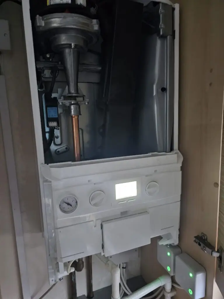 Ideal Logic boiler servicing in Hull - case off 